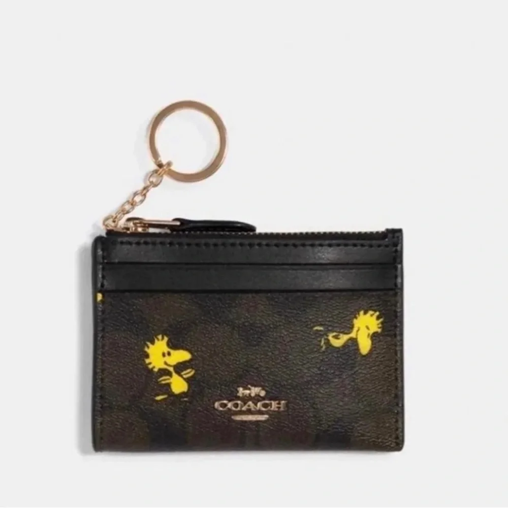 Coach x peanuts woodstock mini skinny ID case